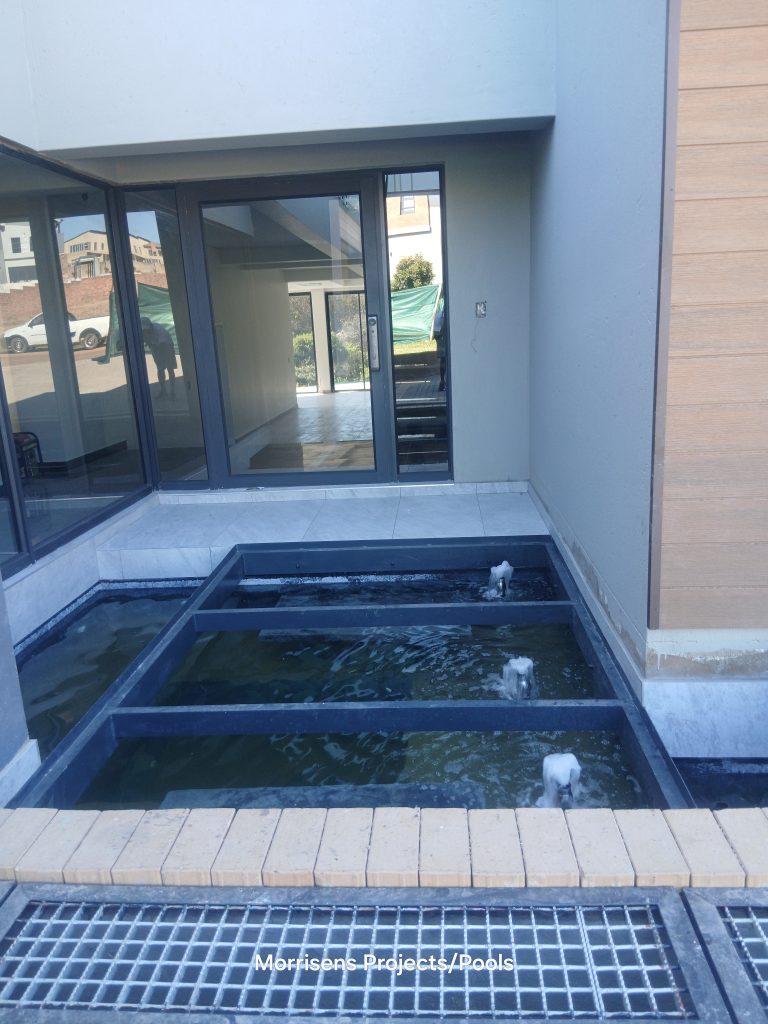 water-feature-an-fish-pond-morrirrisenspools-jpeg